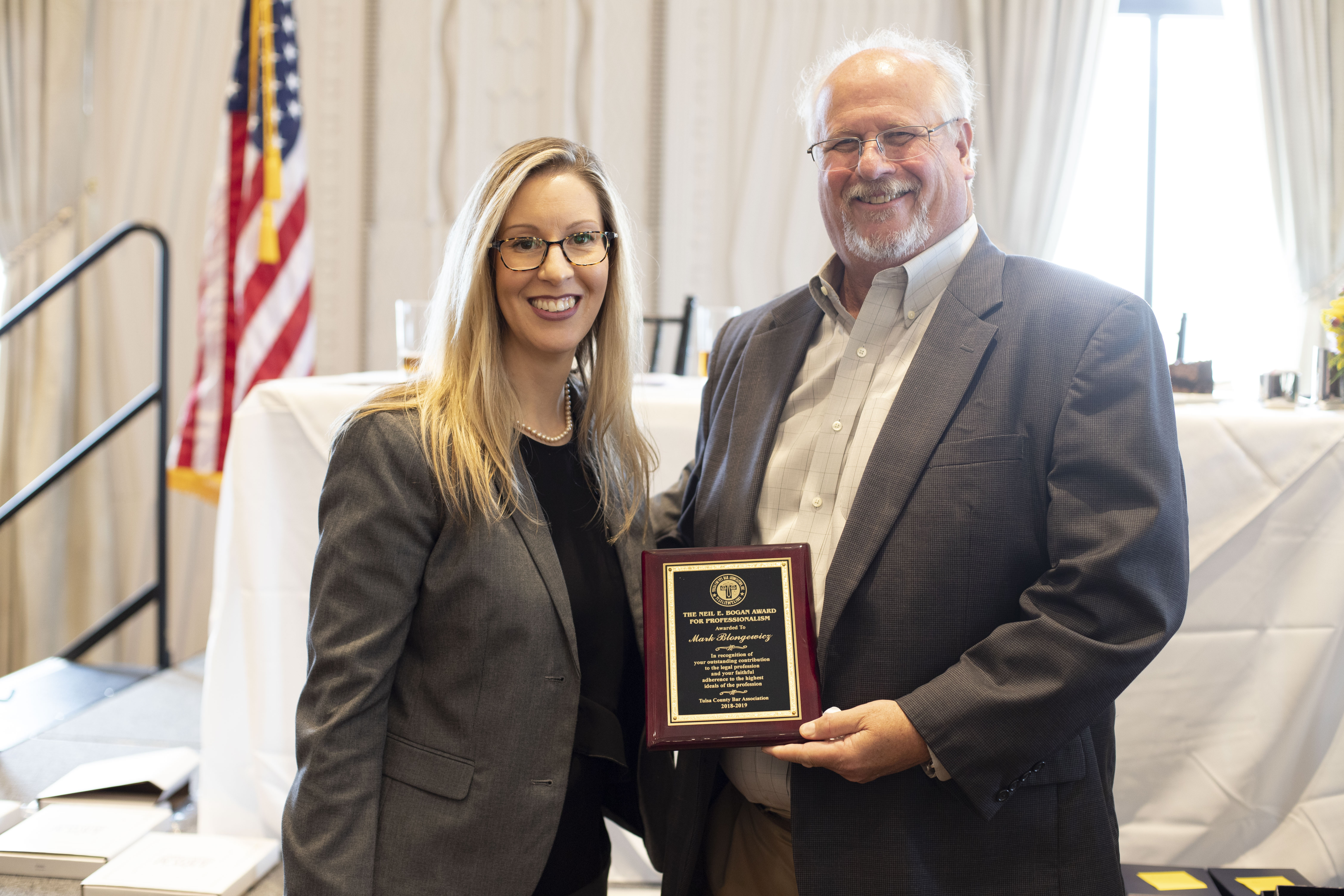 Outgoing TCBA President, Ann Keele, awarded Mark Blongewicz the TCBA Neil E. Bogan Award
